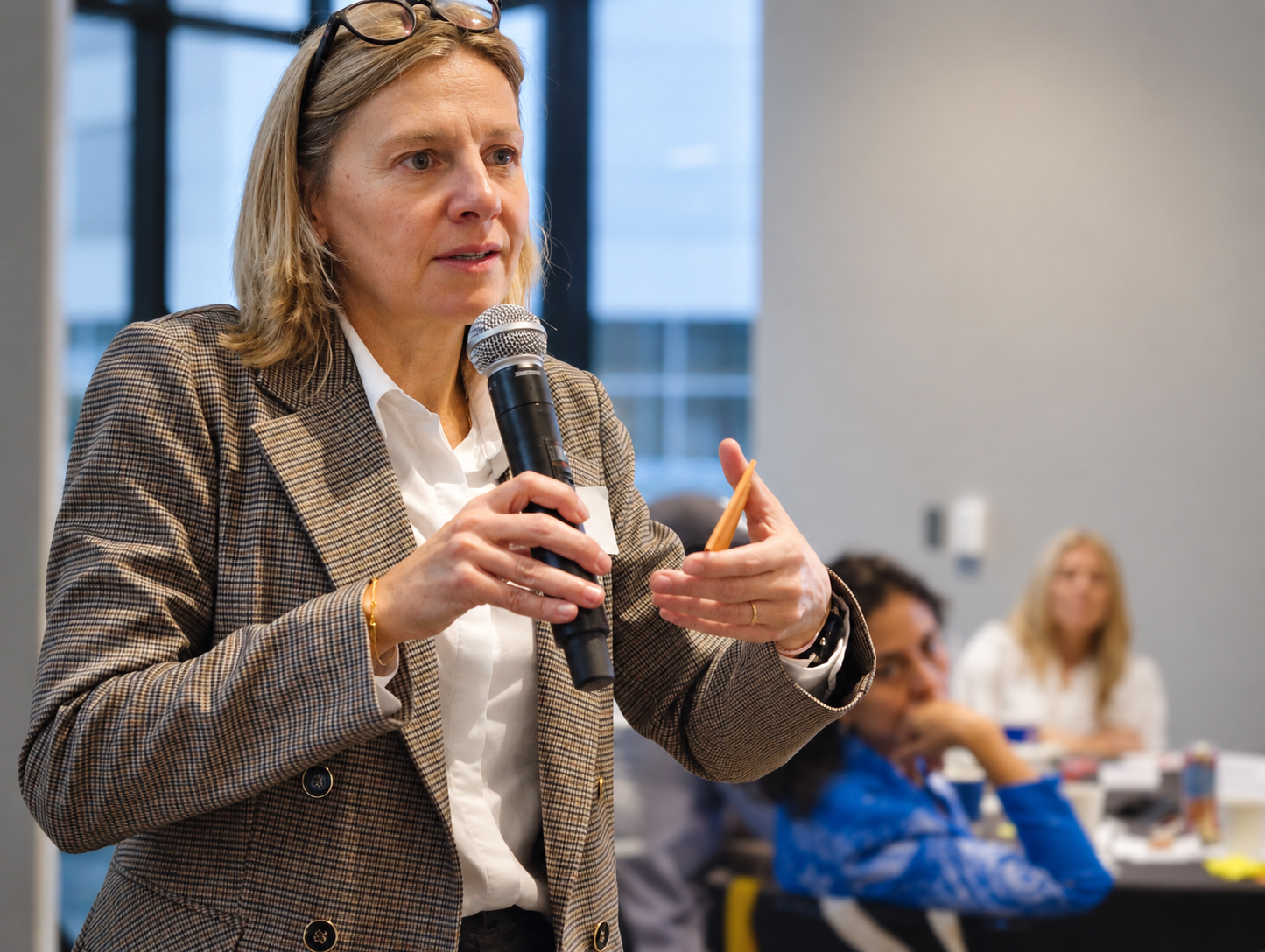 Focused Speaker at Conference Table